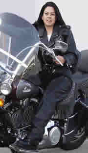 GIRL ON BIKE WEARING C100 LEATHER BIKER JACKET